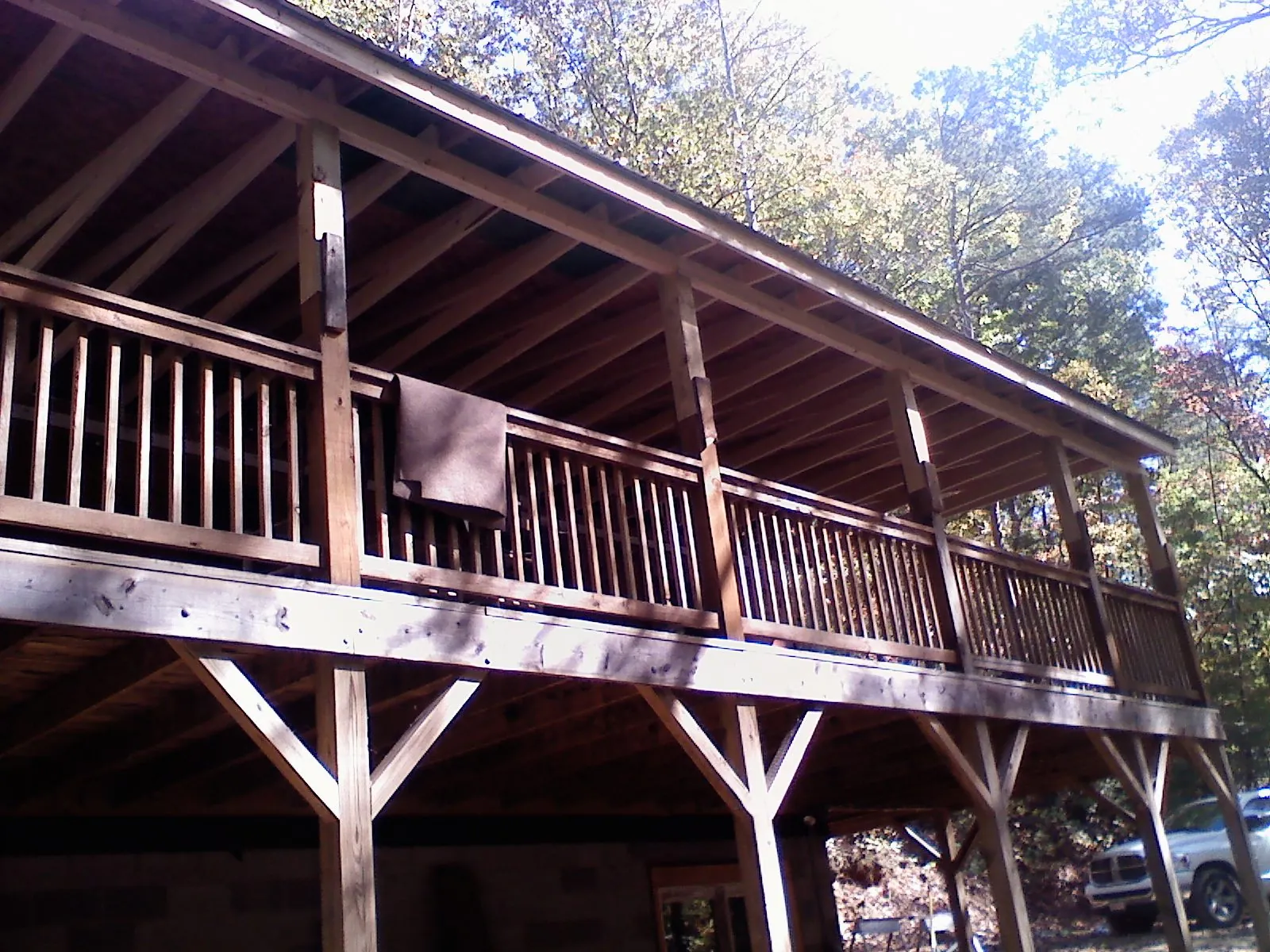 Timber framing under a new elevated porch and deck — Roof Leak Repair in Port Arthur by Roofing Brothers